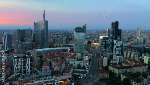 Wallpaper Mural Aerial view of the skyline of a modern cityscape of business skyscrapers. Palazzo Lombardy Region, unicredit tower and UnipolSai, vertical forest. Biblioteca degli Alberi Drone. Milan Italy 13.09.2023 Torontodigital.ca