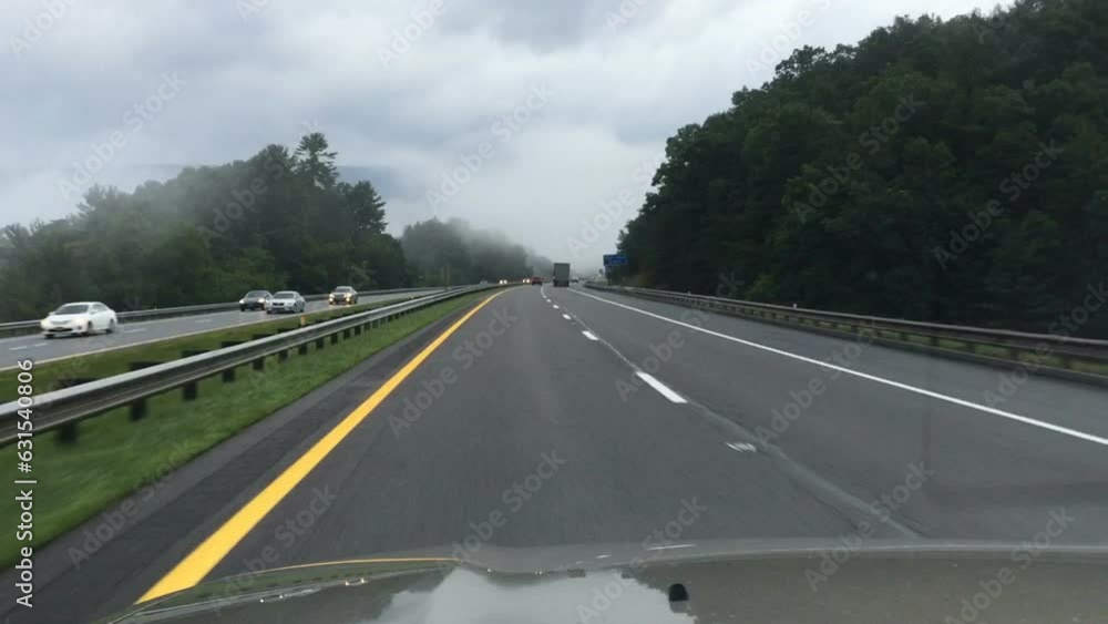 Timelapse of cars driving on the highway on a foggy day Timelapse of cars driving on the highway on a foggy day