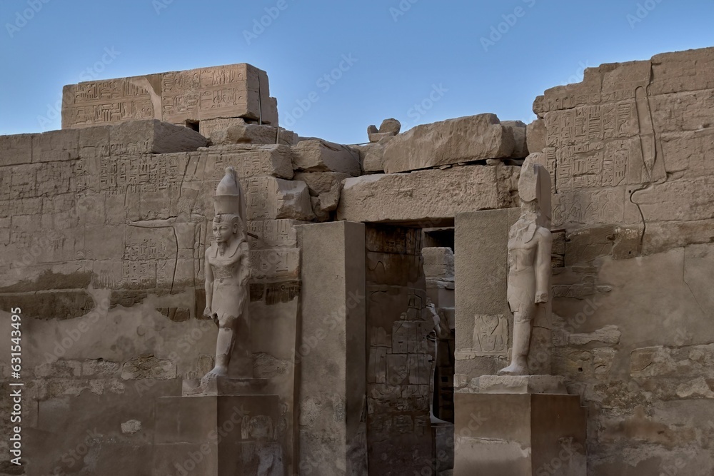 Closeup of ancient Egyptian statues of pharaohs in Karnak temple in Egypt