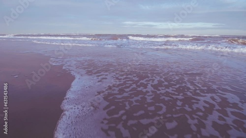 Italian sea shore at sunset photo