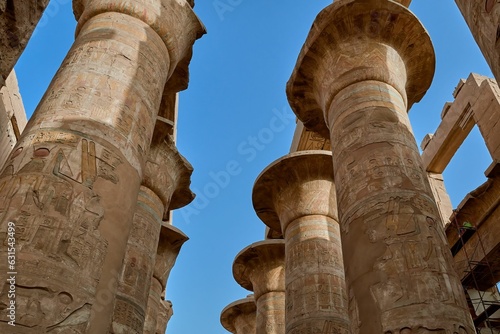 Low-angle shot of the detail of the columns with closed papyriform capitals in  Karnak, Egypt photo