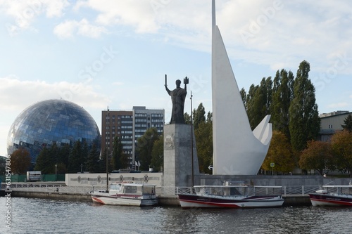 Monument to the pioneers of ocean fishing and the statue of Nicholas the Wonderworker in Kaliningrad photo