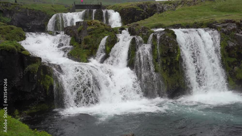 Kirkjufellsfoss waterfall in Iceland in summer Kirkjufellsfoss waterfall in Iceland in summer
