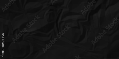 	
Dark crumple black paper wrinkled poster template ,blank glued creased paper texture background. black paper crumled backdrop background. used for cardboard and clarkboard.