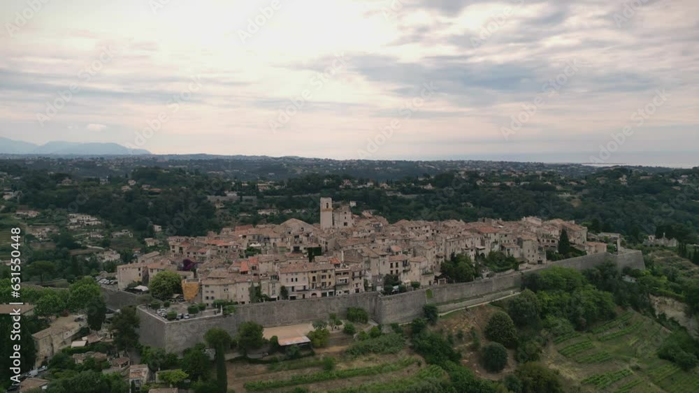 Drone view of Saint paul de vence medieval houses with green hills in France Drone view of Saint paul de vence medieval houses with green hills in France