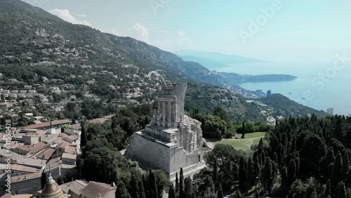 Aerial of the Trophy of Augustus in La Turbie, France with mountains and sea in the background photo