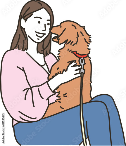 犬と遊ぶ若い女性