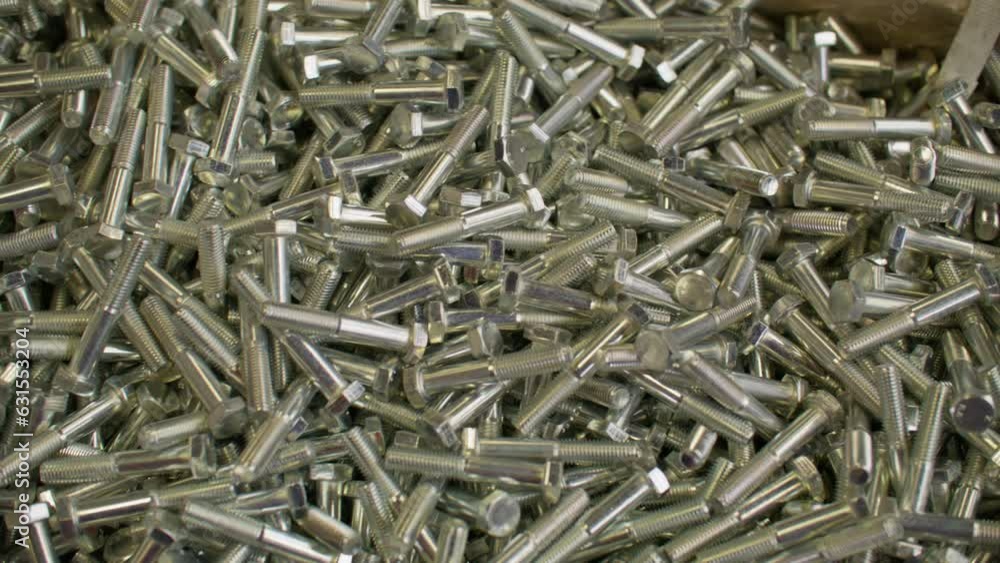 Top-View Shot of Large Quantity of Finished Screws at Factory Top-View Shot of Large Quantity of Finished Screws at Factory