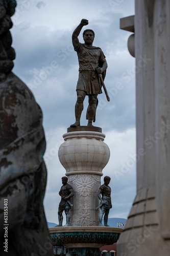 Statue of King Philip II of Macedonia standing atop a pedestal in Skopje City, North Macedonia