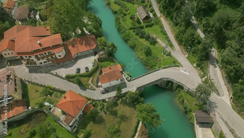 Aerial drone view of Most na Soci, a town in the Municipality of Tolmin in the Littoral region of Slovenia on Soca river.. photo