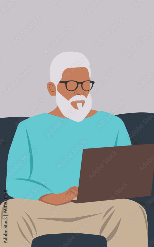 Gray-haired stylish man sitting at a laptop. Can be used as online learning or leisure watching movies or remote work