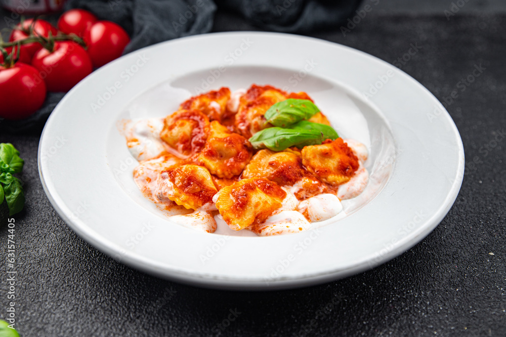 ravioli seafood tomato sauce italian food second course meal food snack on the table copy space food background rustic top view ravioli seafood tomato sauce italian food second course meal food snack on the table copy space food background rustic top view