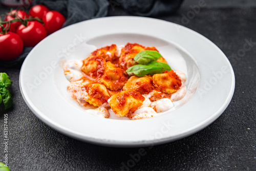 ravioli seafood tomato sauce italian food second course meal food snack on the table copy space food background rustic top view