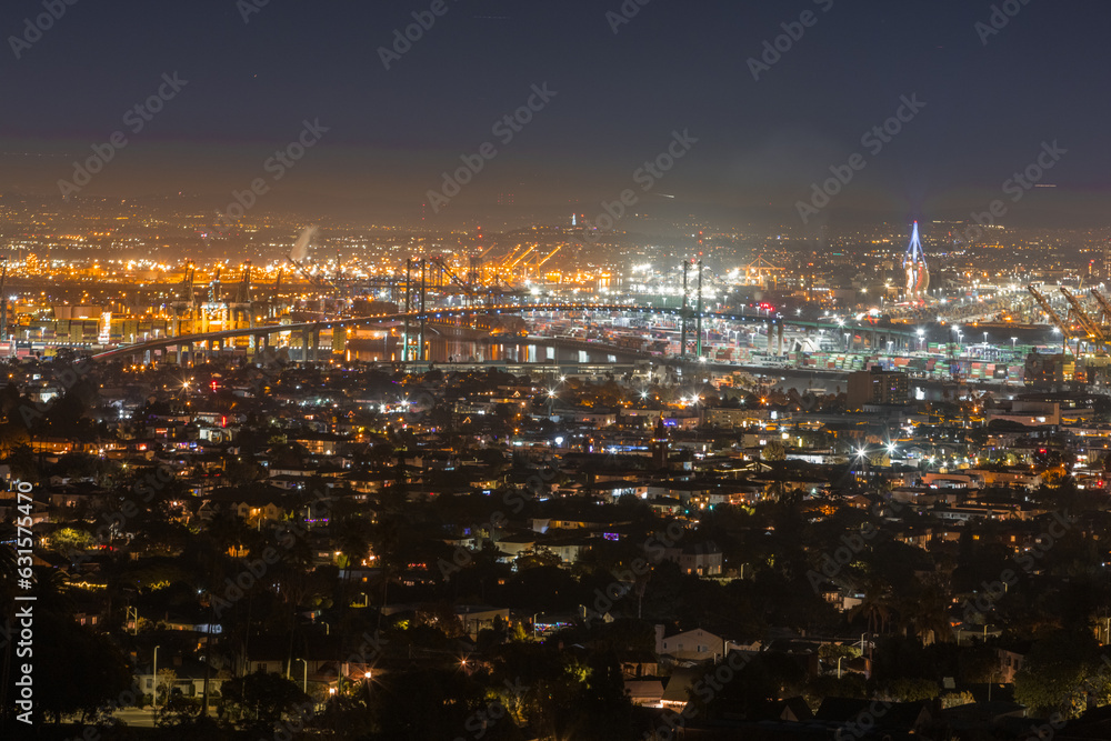 Vincent Thomas Bridge in Long Beach CA with the pier and the San Pedro shipping yard