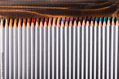 Group of many different types of pencils on an abstract background