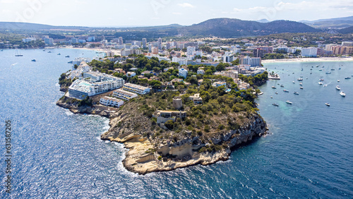 Aerial view of the medieval watch tower of Na Nadala on the cape of Terranova in Magaluf, a seaside resort town on Majorca in the Balearic Islands, Spain photo