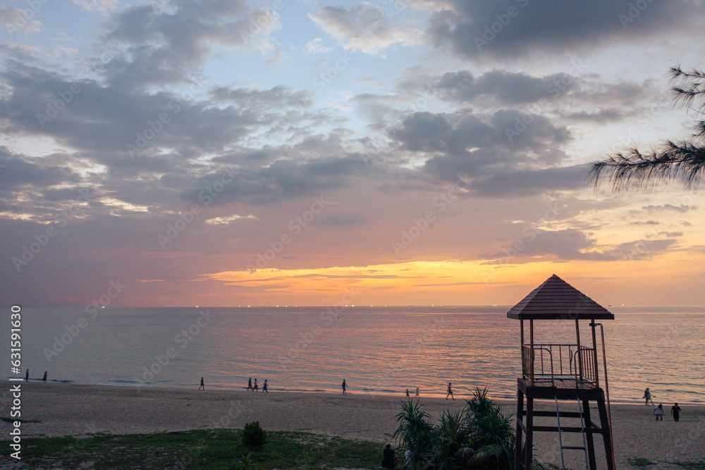sunset at Karon beach.Karon beach is a beach is broad and long. Sand and beautiful beach suitable for swimming and used as a training dive..Karon beach have many kind of water sports sunset at Karon beach.Karon beach is a beach is broad and long. Sand and beautiful beach suitable for swimming and used as a training dive..Karon beach have many kind of water sports