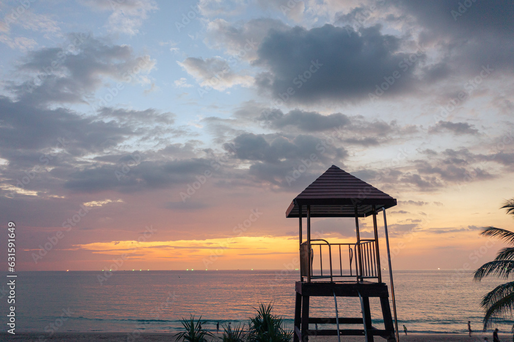 sunset at Karon beach.Karon beach is a beach is broad and long. Sand and beautiful beach suitable for swimming and used as a training dive..Karon beach have many kind of water sports sunset at Karon beach.Karon beach is a beach is broad and long. Sand and beautiful beach suitable for swimming and used as a training dive..Karon beach have many kind of water sports