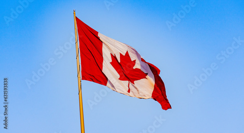 canadian flag waving in the wind
