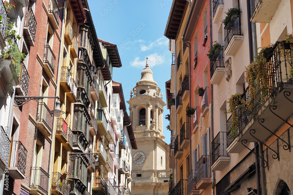 beautiful street in pamplona with the bell tower in the background