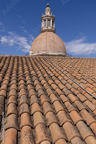 View from observation deck on top of San Nicolo l'Arena church of roof and dome with cross, Catania, Sicily, Italy © mychadre77