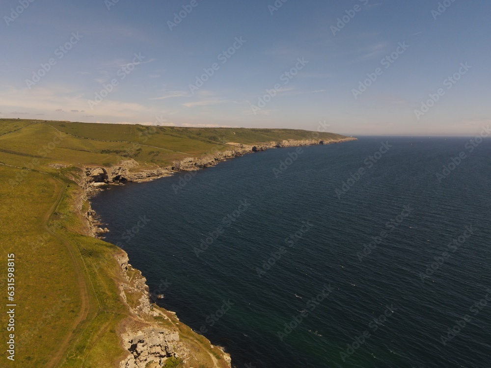 Obraz premium Jurassic hills, cliffs and rocks along the iconic Dorset coastline, near Winspit Quarry.
