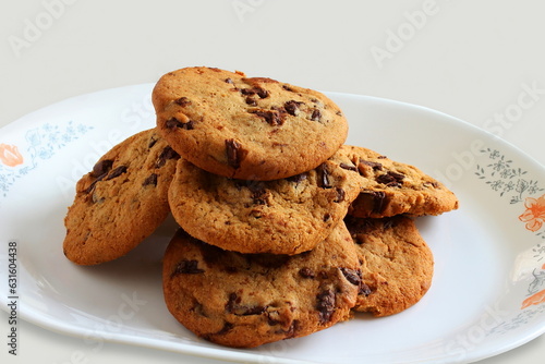 tasty organic homemade dark chocolate chip oatmeal cookies,sweet snack biscuit in dish