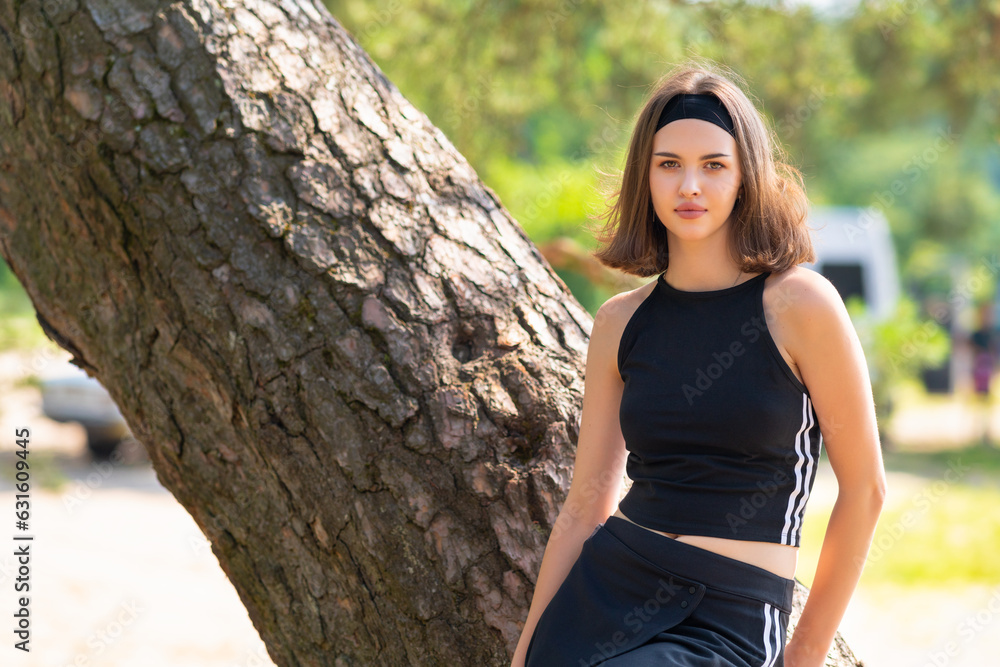 Girl in sportswear looking at the camera