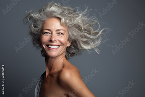 Lifestyles and fashion concept. Close-up studio portrait of happy and beautiful mature woman model. Generative AI