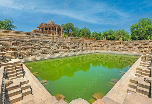 The Sun Temple at Modhera is an ancient Hindu temple located in the western state of Gujarat, India. Built in the 11th century during the reign of the Solanki dynasty, the temple was dedicated to Sun photo