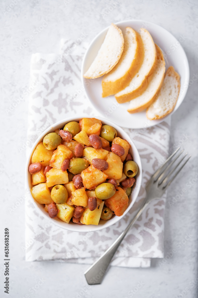 Puerto Rican traditional potato red kidney bean stew in a bowl Puerto Rican traditional potato red kidney bean stew in a bowl
