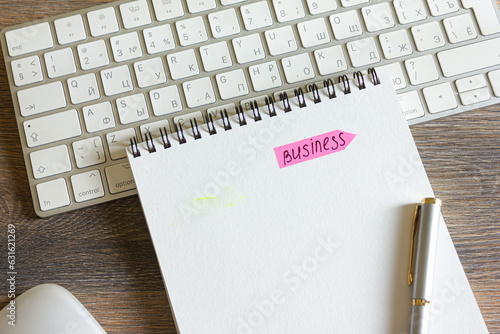 notebook and pen on the table