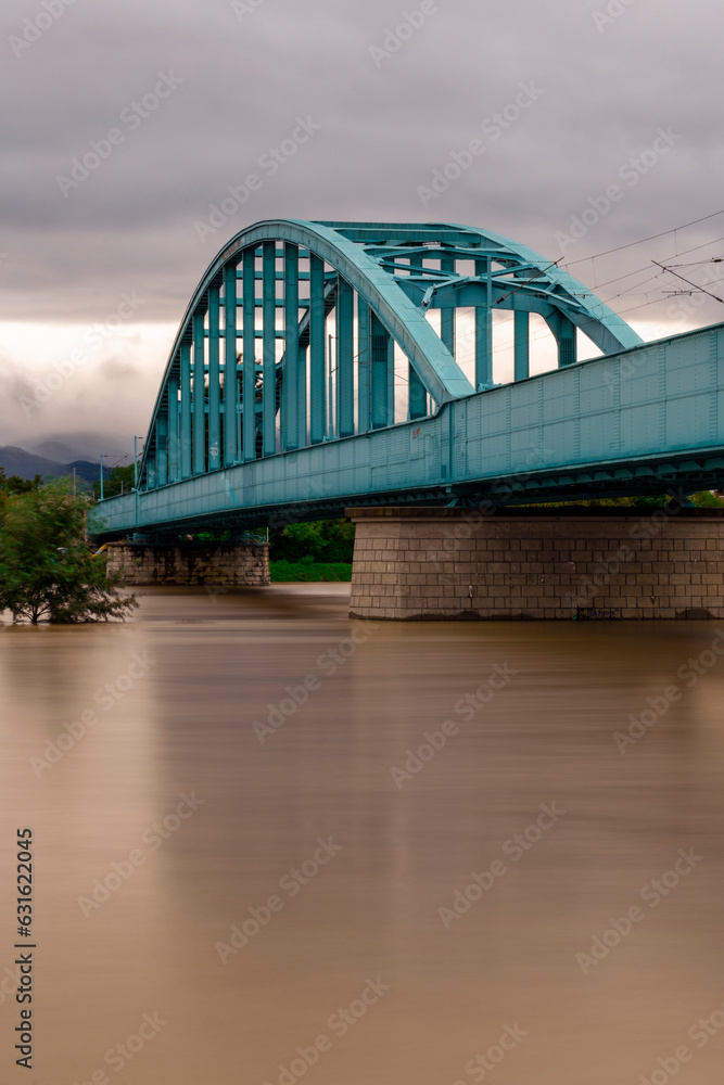 Obraz premium Zagreb city Hendrix railway bridge photographed against flooded Sava river after water level rised after devastating storm and heavy rain in Slovenia