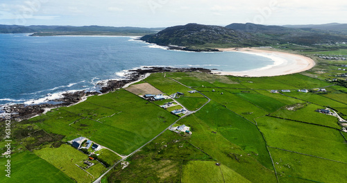 Aerial view of houses by the sea Coastal Rugged Ireland photo