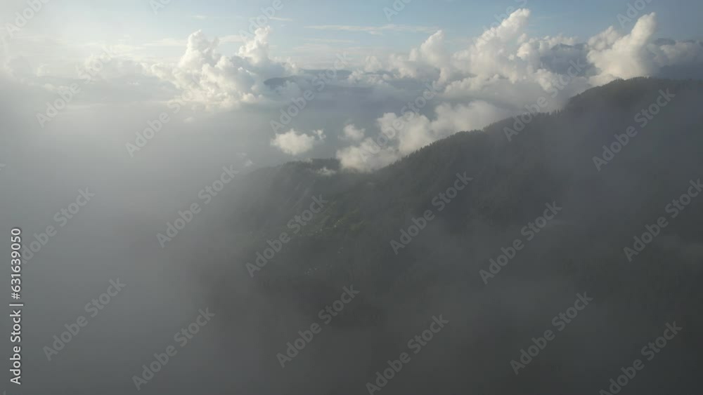 Drone Shot of Mountains and Forest Emerging from the Fog Drone Shot of Mountains and Forest Emerging from the Fog