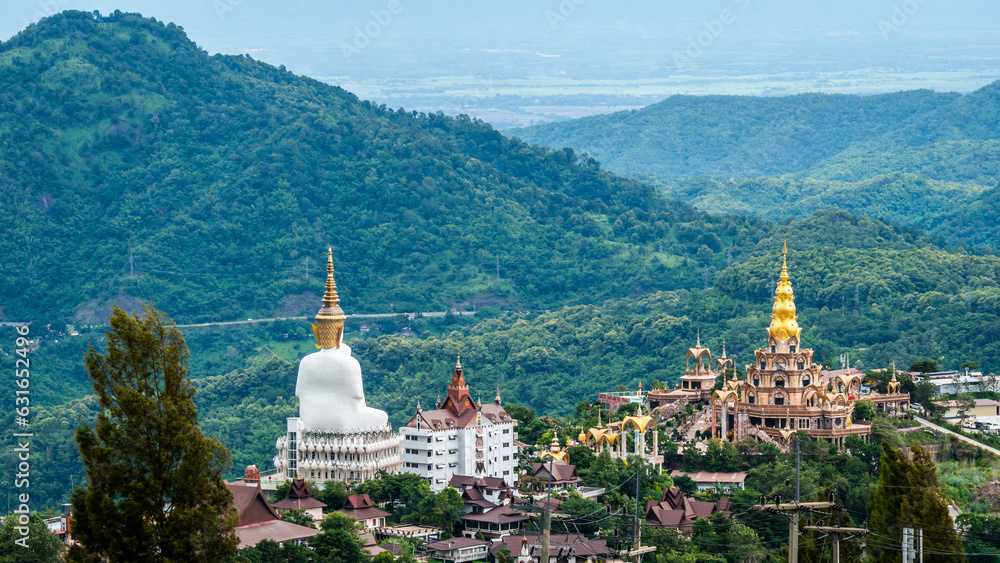 Wat Phra That Pha Son Kaew, wide view with mountain views and sky when it's cloudy. It is a popular destination for tourists.