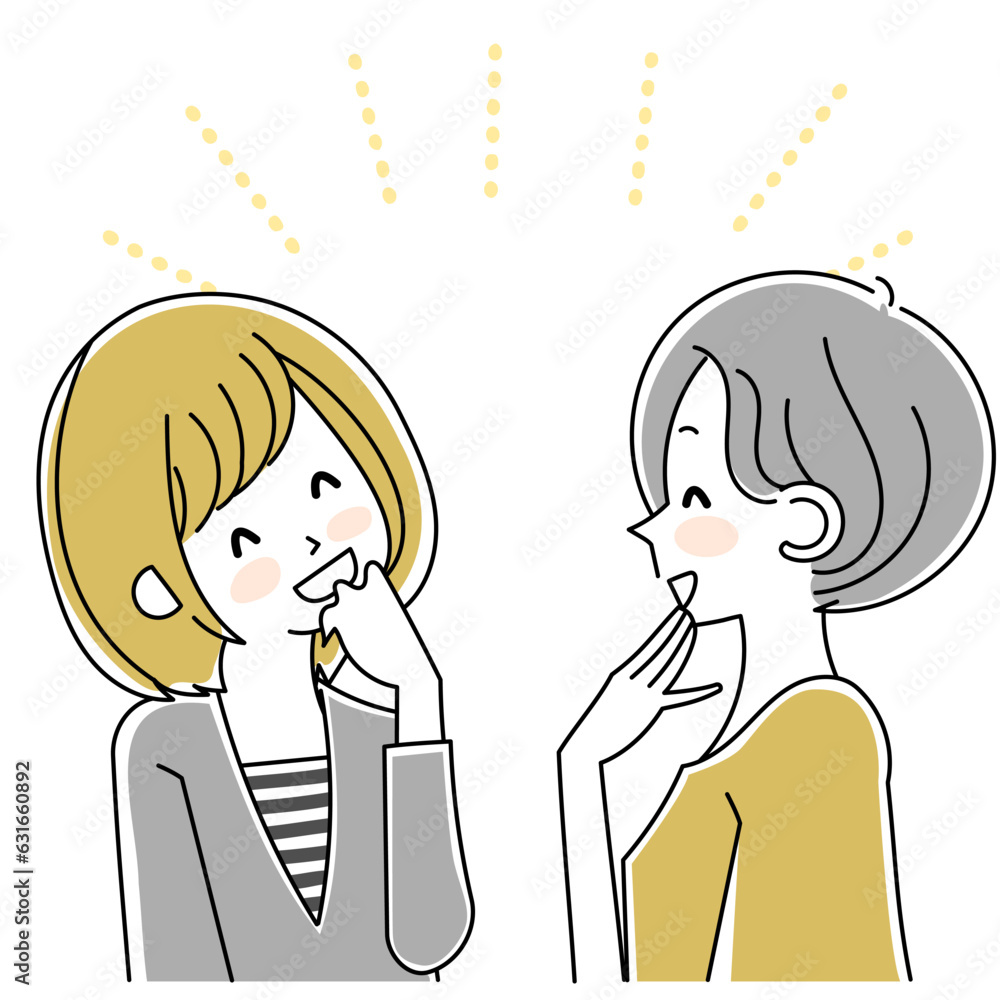 笑いながら会話する2人の女性