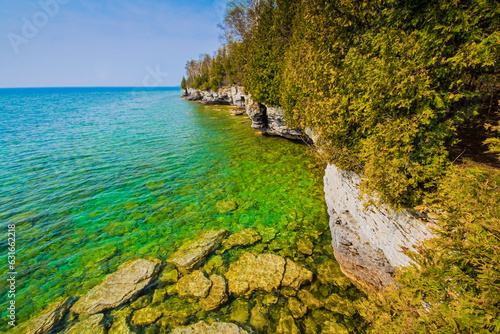 Photos Green Waters of Lake Michigan and The Limestone Bluffs of Cave Point, Cave Point