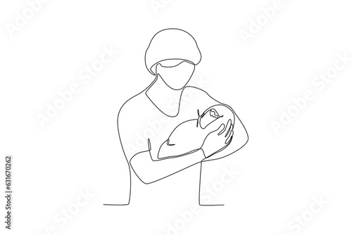 One single line drawing of a midwife holding newborn baby
 photo