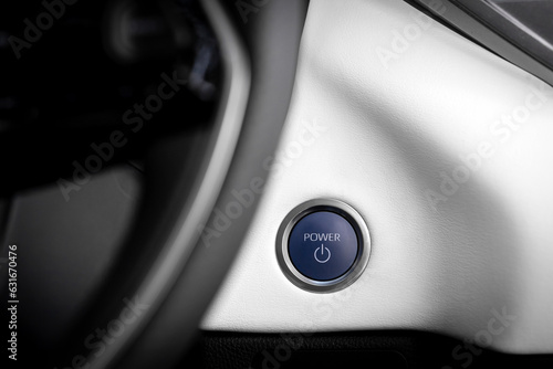  Start stop engine modern new car button, close up