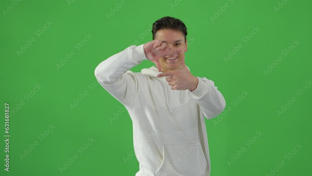 Young good-looking man in a green screen studio - people photography Young good-looking man in a green screen studio - people photography