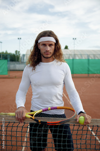 Portrait of serious male tennis player feeling strong and motivation © Nomad_Soul