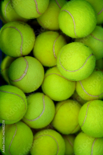 Lots of vibrant green tennis ball pattern background © Nomad_Soul