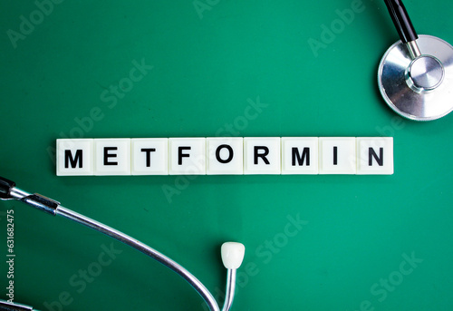 stethoscope and alphabet letters with the word Metformin. medical and health concepts photo
