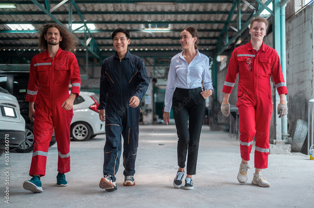Obraz premium Portrait group of professional car repair people in auto maintenance shop