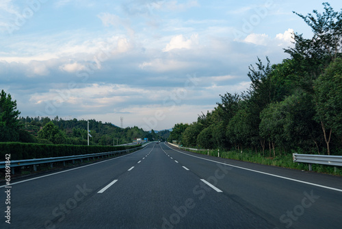 highway road and green forest with mountain nature landscape