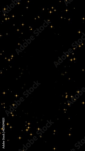 外側に向かう金色の星のキラキラパーティクルエフェクト素材(背景透過)アルファチャンネル付MOV　縦型