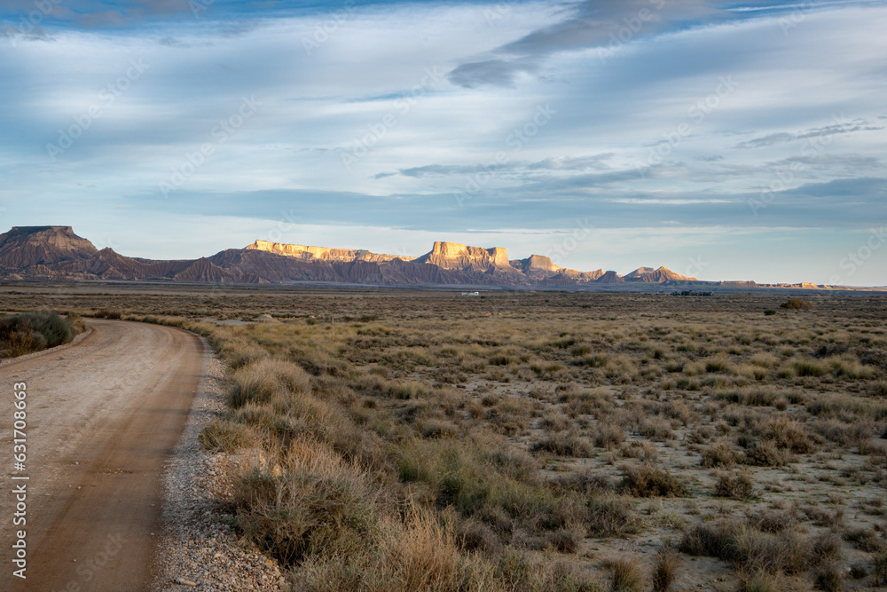 Naklejka premium Bardenas Reales desert landscape scenic view with road, in Spain