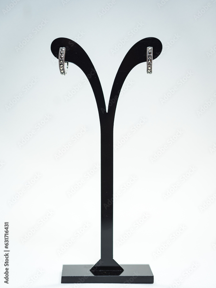 Beautiful jewelry display on white background Beautiful jewelry display on white background