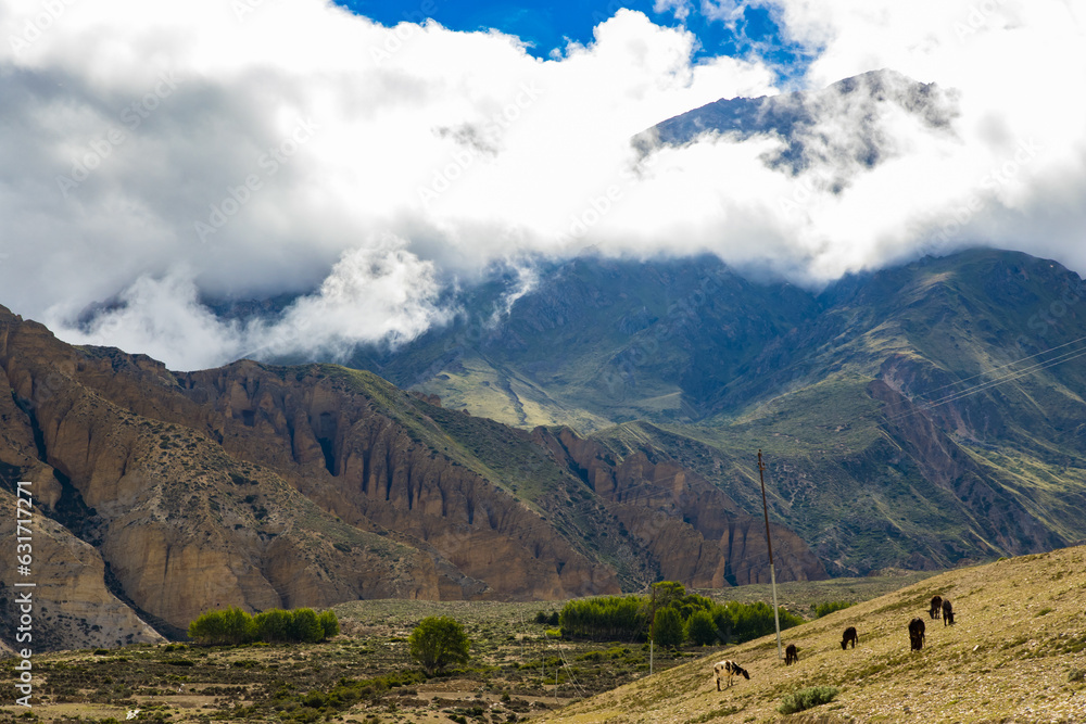 Beautiful and Dramatic Tibetan Landscape with Farmalnd in Ghiling Village of Upper Mustang in Nepal Beautiful and Dramatic Tibetan Landscape with Farmalnd in Ghiling Village of Upper Mustang in Nepal